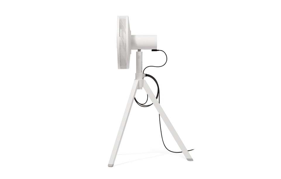 White NatureWind Studio fan from the side on its tripod legs